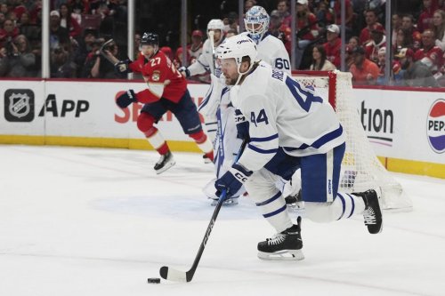 Toronto Maple Leafs defenceman Morgan Rielly (44) skates with the puck during the first period in Game 6 of a second-round NHL hockey playoff series against the Florida Panthers, Friday, May 16, 2025, in Sunrise, Fla. (AP Photo/Lynne Sladky)