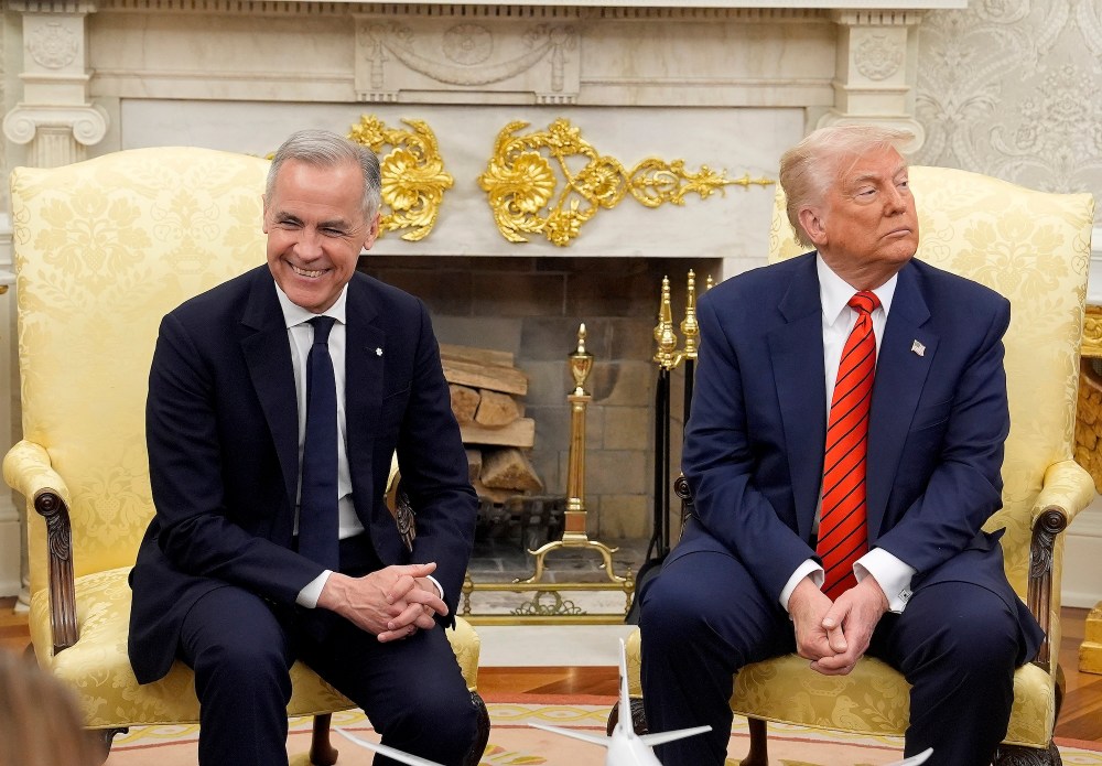 Prime Minister Mark Carney and U.S. President Donald Trump engage in a meeting at the White House in Washington, D.C., Tuesday, May 6, 2025. THE CANADIAN PRESS/Adrian Wyld