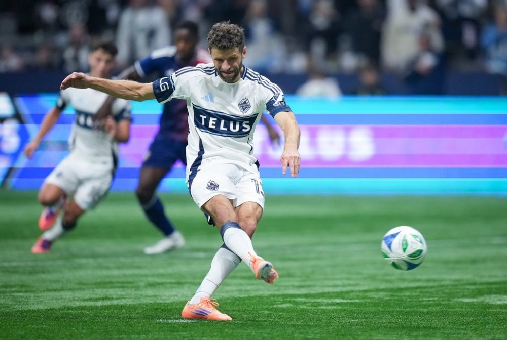 Vancouver Whitecaps' Thomas Muller scores on a penalty kick during the second half in Game 1 of a first round MLS Cup playoff soccer match against FC Dallas, in Vancouver, B.C., Sunday, Oct. 26, 2025. THE CANADIAN PRESS/Darryl Dyck