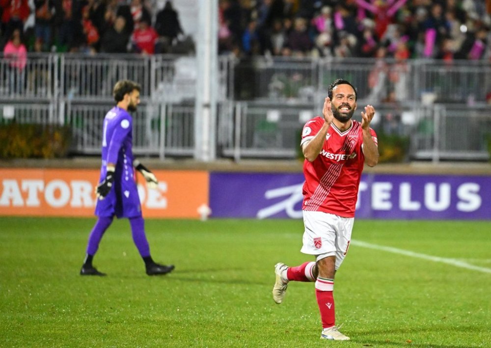 Sergio Camargo, right, celebrates his goal for Cavalry FC in a 1-1 draw with Forge FC in Canadian Premier League play Oct. 10, 2025, at ATCO Field in Calgary. THE CANADIAN PRESS/Handout — Calgary CFC Media — Mike Sturk (Mandatory credit)