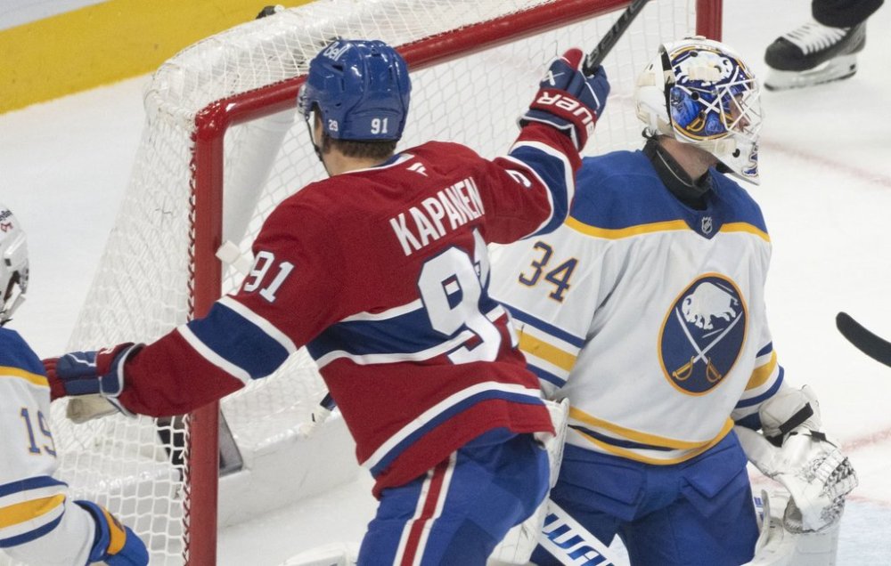 Montreal Canadiens' Oliver Kapanen (91) celebrates his goal over Buffalo Sabres goaltender Alex Lyon (34) during first period NHL hockey action in Montreal on Monday, Oct. 20, 2025. THE CANADIAN PRESS/Christinne Muschi