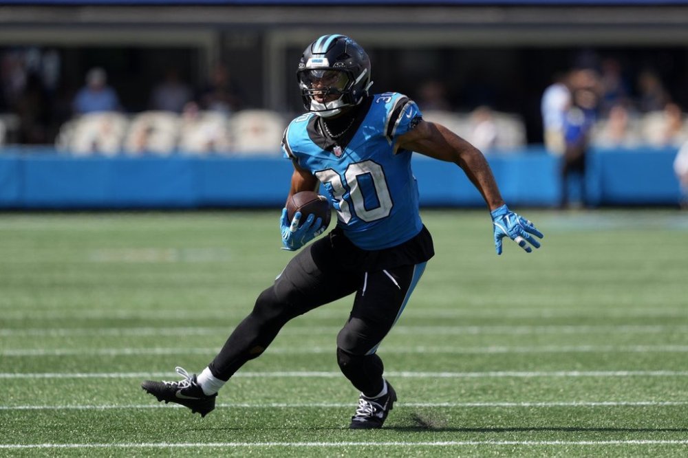 Carolina Panthers running back Chuba Hubbard runs against the Atlanta Falcons during the second half of an NFL football game, Sunday, Sept. 21, 2025, in Charlotte, N.C. (AP Photo/Jacob Kupferman)