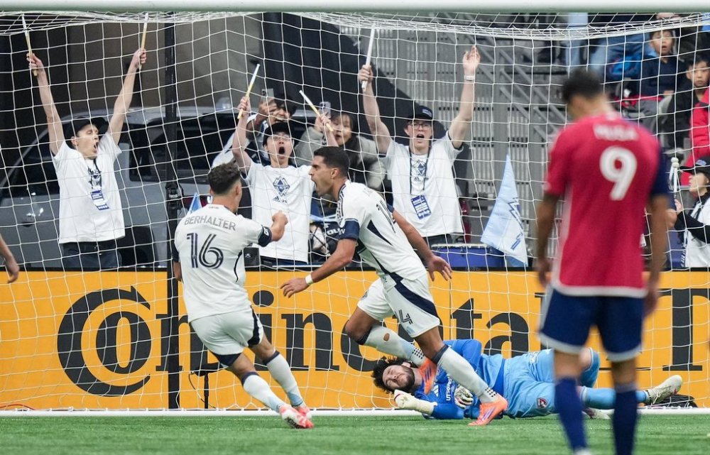 Vancouver Whitecaps' Daniel Rios (14) and Sebastian Berhalter (16) celebrate Rios' goal against FC Dallas goalkeeper Michael Collodi during the first half in Game 1 of a first round MLS Cup playoff soccer match, in Vancouver, B.C., Sunday, Oct. 26, 2025. THE CANADIAN PRESS/Darryl Dyck
