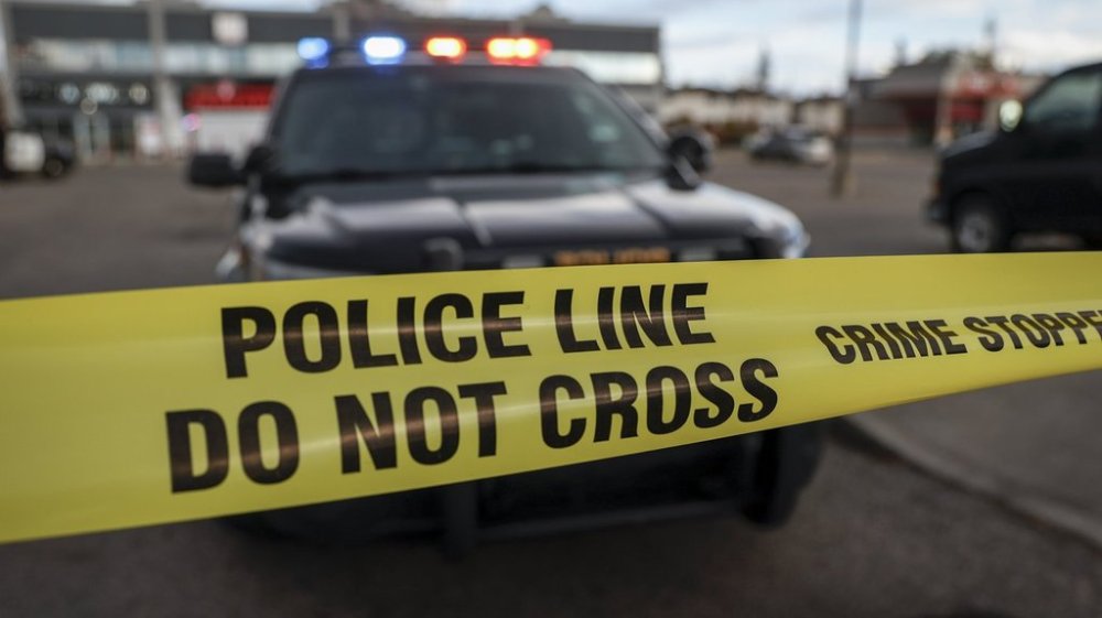 Crime scene tape is shown in Calgary on Wednesday, Oct. 18, 2023. THE CANADIAN PRESS/Jeff McIntosh
