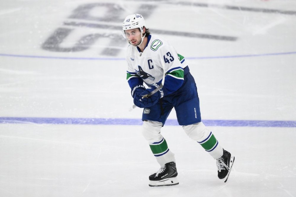 Vancouver Canucks defenceman Quinn Hughes (43) in action during the third period of an NHL hockey game against the Washington Capitals, Sunday, Oct. 19, 2025, in Washington. (AP Photo/Nick Wass)