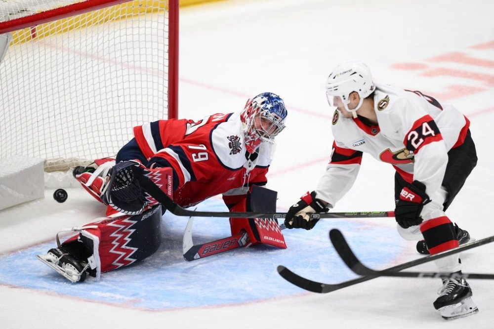 Ottawa Senators centre Dylan Cozens (24) scores past Washington Capitals goaltender Charlie Lindgren (79) during the second period of an NHL hockey game, Saturday, Oct. 25, 2025, in Washington. (AP Photo/Nick Wass)