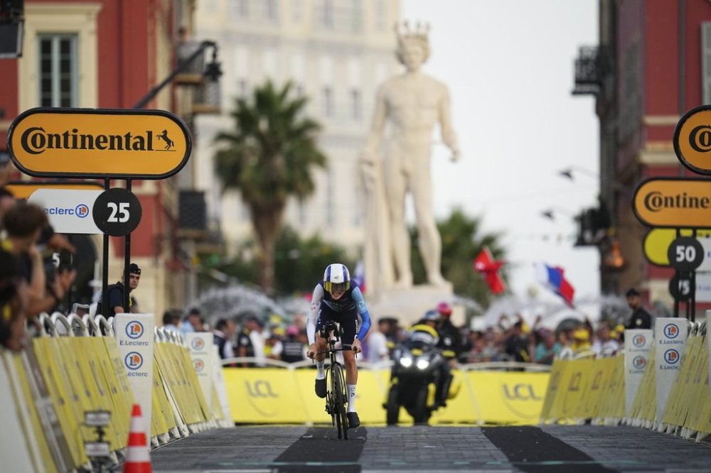 Canada's Derek Gee speeds to the finish line of the twenty-first stage of the Tour de France cycling race, an individual time trial over 33.7 kilometres (20.9 miles) with start in Monaco and finish in Nice, France, Sunday, July 21, 2024. (AP Photo/Daniel Cole)