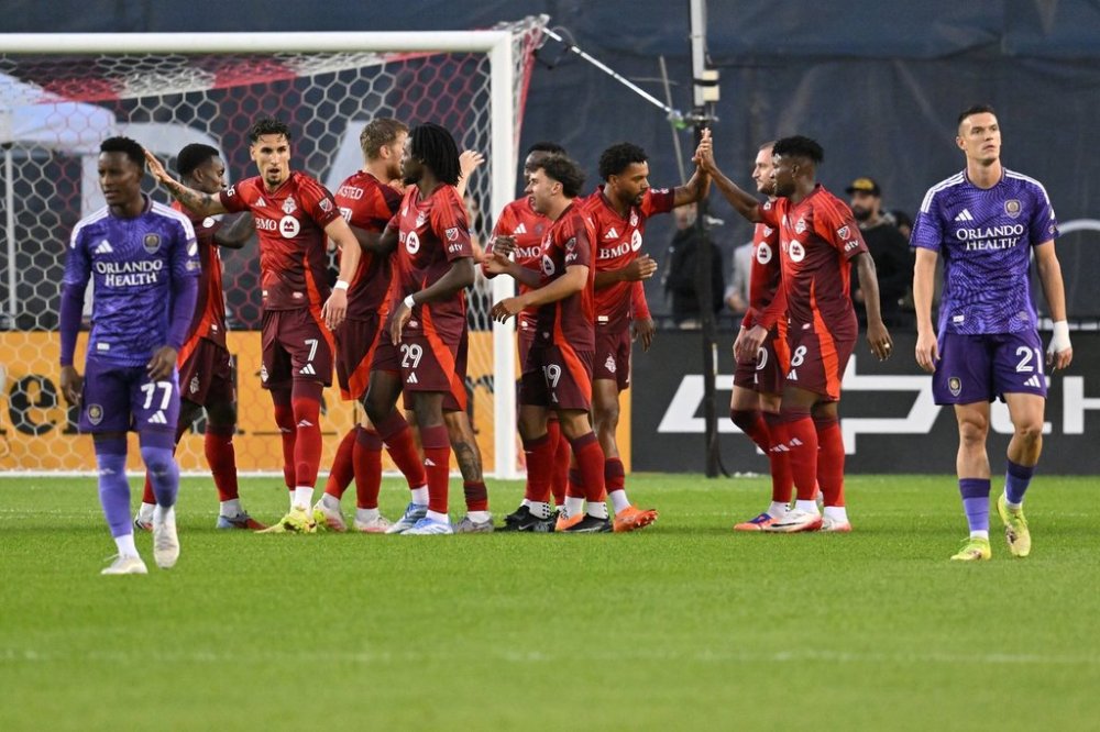 Toronto FC celebrate a goal against Orlando City SC during first half MLS soccer action in Toronto on Saturday, Oct. 18, 2025. THE CANADIAN PRESS/Jon Blacker