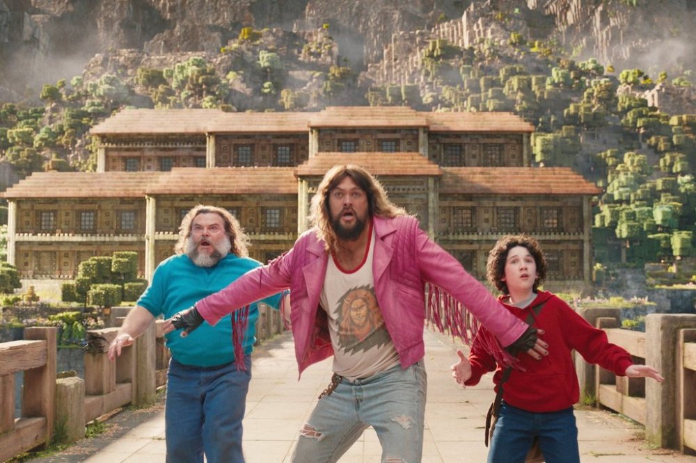 This image released by Warner Bros. Pictures shows, from left, Jack Black, Jason Momoa and Sebastian Hansen in a scene from
