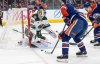 Minnesota Wild' Jesper Wallstedt (30) makes the save on Edmonton Oilers' Curtis Lazar (20) during second period NHL action, in Edmonton on Tuesday, December 2, 2025. THE CANADIAN PRESS/Jason Franson