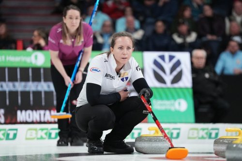 Team Homan skip Rachel Homan, right, watches a stone from the house as Team Black skip Christina Black looks on during Game 2 of the women's final at the Montana's Canadian Curling Trials in Halifax on Nov. 29, 2025. THE CANADIAN PRESS/Darren Calabrese