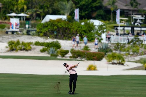 Cameron Young, of the United States, watches his shot from the first fairway during the second round of the Hero World Challenge PGA Tour at the Albany Golf Club, in New Providence, Bahamas, Friday, Dec. 5, 2025. (AP Photo/Fernando Llano)