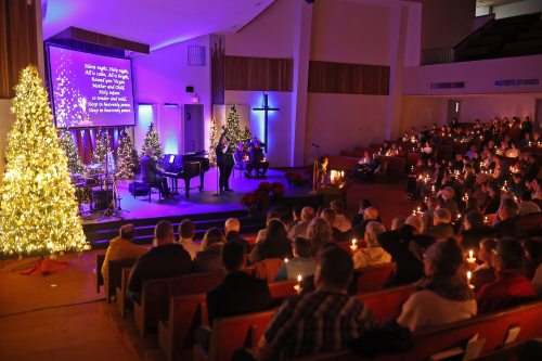 Brandonites holds candles in memory of loved ones during the 2024 Brockie Donovan Tree of Memories Community Candlelight Memorial Service. The 28th service will be held next week. (Tim Smith/The Brandon Sun files)