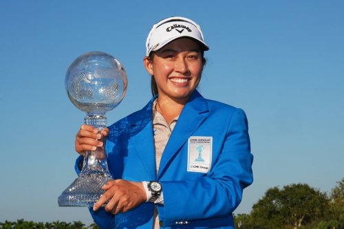 Jeeno Thitikul of Thailand holds the CME Global Trophy after winning the LPGA Tour Championship golf tournament, Sunday, Nov. 23, 2025, in Naples, Fla. (AP Photo/Marta Lavandier)