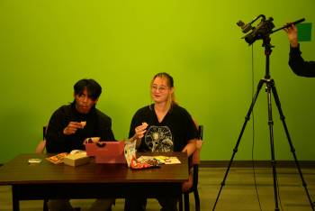Shown here in Neepawa’s Community Access Television Station (NACTV) are Marbert Tagbacaola (left) and Keira Mendoza McKay, during filming of a show. The TV station will have its annual general meeting this month, and is looking for more volunteers. (File)