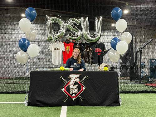 Emily Beckwith signs her commitment papers to Dickinson State University at TC Sports Indoor Facility. (Submitted)