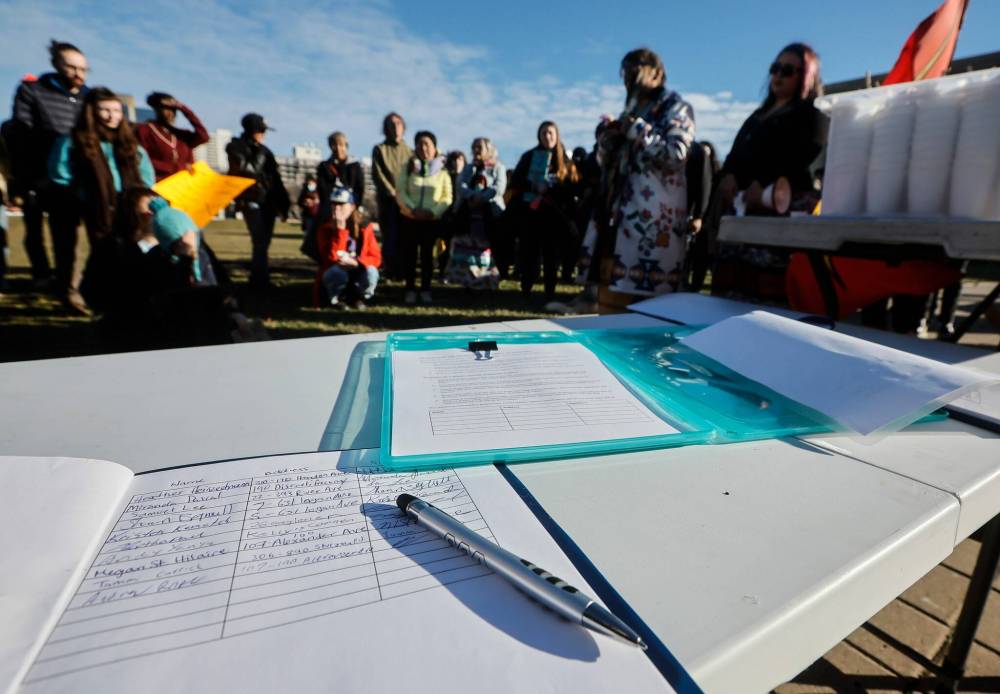 Some people gathered at the legislature on Sunday to protest and sign a petition against the Manitoba government’s introduction of 72-hour detention of people using drugs at the legislature in Winnipeg. (John Woods/Winnipeg Free Press)
