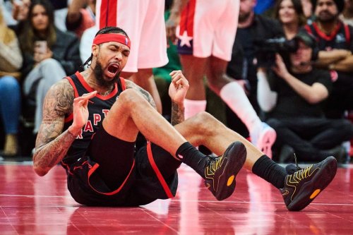 Toronto Raptors' Brandon Ingram (3) reacts after a fall during second half NBA basketball action against the Washington Wizards in Toronto, on Friday, Nov. 21, 2025. THE CANADIAN PRESS/Sammy Kogan