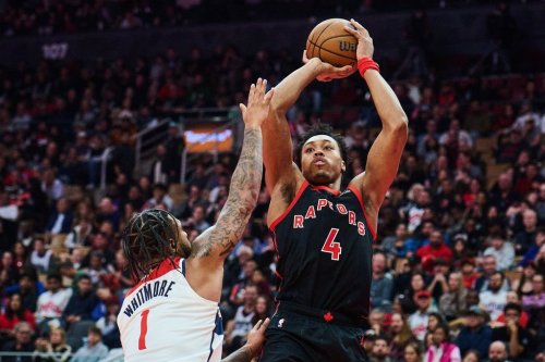 Toronto Raptors' Scottie Barnes (4) shoots over Washington Wizards' Cam Whitmore (1) during first half NBA basketball action in Toronto, on Friday, Nov. 21, 2025. THE CANADIAN PRESS/Sammy Kogan