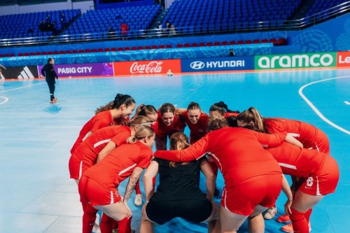 Canada players huddle before their game against Colombia in Group B play at the inaugural FIFA Futsal Women's World Cup in Pasig City, Philippines, in a Saturday, Nov. 22, 2025, handout photo. THE CANADIAN PRESS/Handout — Canada Soccer (Mandatory Credit)