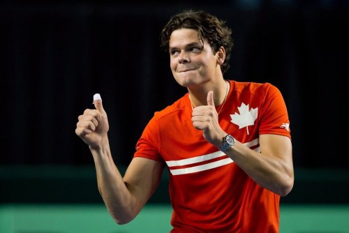 Canada's Milos Raonic, of Toronto, Ont., gestures to the crowd after defeating Spain's Guillermo Garcia-Lopez during a Davis Cup tennis world group first-round tie singles match in Vancouver, B.C., on Sunday February 3, 2013. The victory gave Canada a win over Spain in the first round tie. THE CANADIAN PRESS/Darryl Dyck