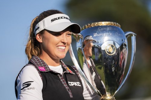 Canada's Brooke Henderson poses with the trophy after winning the CPKC Women's Open at the Mississauga Golf and Country Club in Mississauga, Ont., Sunday, Aug. 24, 2025. THE CANADIAN PRESS/Thomas Skrlj