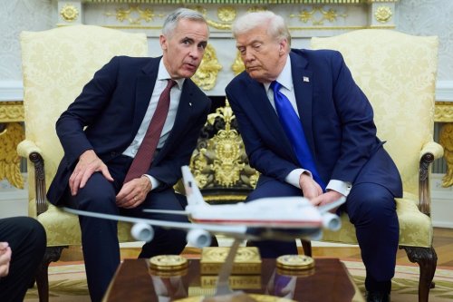 U.S. President Donald Trump meets with Canadian Prime Minister Mark Carney in the Oval Office of the White House on Tuesday, Oct. 7, 2025, in Washington. (AP Photo/Evan Vucci)