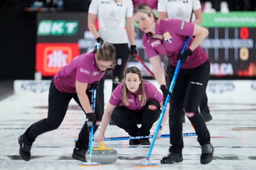 Skip Christina Black, centre, watches her shot during Game 1 of the Montana's Canadian Curling Trials final against Team Homan in Halifax on Nov. 28, 2025. THE CANADIAN PRESS/Darren Calabrese