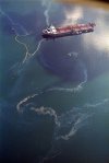 In this April 9, 1989 file photo, crude oil from the tanker Exxon Valdez, top, swirls on the surface of Alaska's Prince William Sound near Naked Island. THE CANADIAN PRESS/AP, John Gaps III
