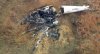 Debris from a helicopter is shown after two helicopters crashed in Hammonton, N.J., on Sunday, Dec. 28, 2025. (WPVI-TV/6ABC via AP)