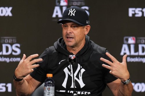 FILE — New York Yankees manager Aaron Boone talks to reporters at Yankee Stadium in New York, Oct. 6, 2025. (AP Photo/Seth Wenig, File)