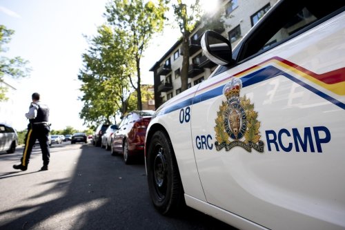 RCMP personnel are seen during an active investigation in Montreal on Wednesday, August 20, 2025. THE CANADIAN PRESS/Christopher Katsarov