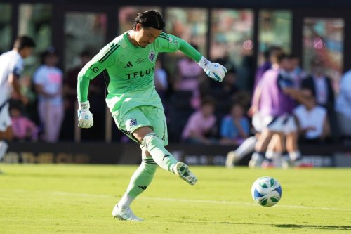 Vancouver Whitecaps goalkeeper Yohei Takaoka (1) returns the ball during the first half of the MLS Cup final soccer match against the Inter Miami Saturday, Dec. 6, 2025, in Fort Lauderdale, Fla. (AP Photo/Lynne Sladky)