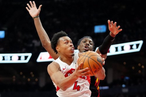 Toronto Raptors forward Scottie Barnes (4) looks for the shot past Atlanta Hawks forward Onyeka Okongwu (17) during first half NBA basketball action in Toronto, Monday, Jan. 5, 2026. THE CANADIAN PRESS/Frank Gunn