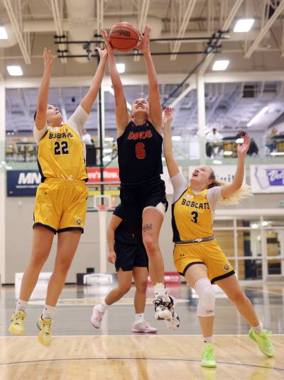 Jayna Maytwayashing, left, has stepped up as BU&rsquo;s starter at the five spot, averaging 6.5 rebounds per game. (Tim Smith/The Brandon Sun)