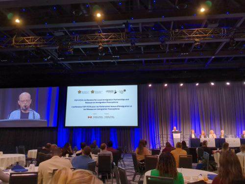 Mitch Tilk makes a presentation at the Pathways to Prosperity national immigration conference in Halifax. (Submitted)