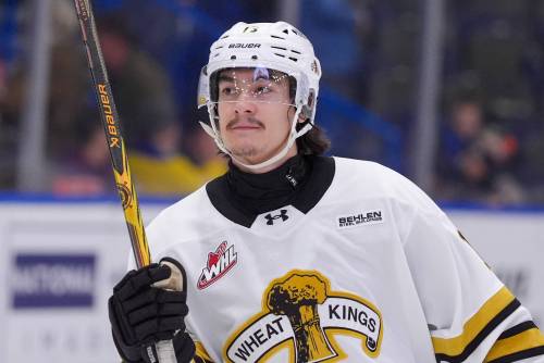 Brandon Wheat Kings forward Jordan Gavin (13), shown celebrating his two-goal effort in a 3-2 victory over the Saskatoon Blades during Western Hockey League action at SaskTel Centre on Nov. 22, was acquired in a deal a year ago that saw defnceman Charlie Elick go the other way. (Steve Hiscock/Saskatoon Blades)