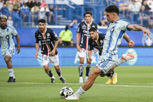 CF Montreal's Matias Coccaro (9) takes a penalty kick against Atletico de San Luis during first half Leagues Cup soccer action in Montreal, Tuesday, July 30, 2024. THE CANADIAN PRESS/Graham Hughes