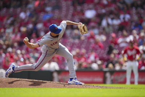 New York Mets pitcher Tyler Rogers throws during a baseball game against the Cincinnati Reds, Sunday, Sept. 7, 2025, in Cincinnati. (AP Photo/Jeff Dean)
