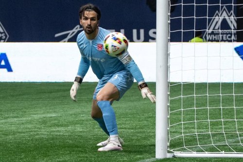 Cavalry FC goalkeeper Marco Carducci watches the ball go wide of the net against the Vancouver Whitecaps during the second half of a Canadian Championship quarterfinal soccer match, in Vancouver, on Tuesday, May 21, 2024. THE CANADIAN PRESS/Ethan Cairns