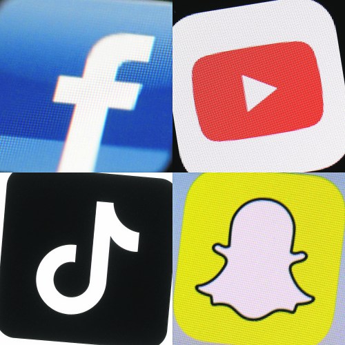 This combination of photos shows the logos of Facebook, YouTube, TikTok and Snapchat on mobile devices. Social media is one factor that has fuelled a shift to a post-truth world, Colin Shaw writes. (The Associated Press)