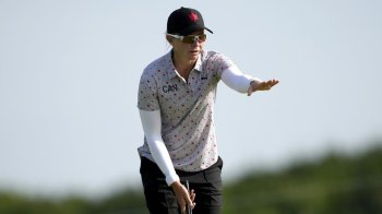 Alena Sharp, of Canada, watches her putt during a practice round for the women's golf event at the 2024 Summer Olympics, Tuesday, Aug. 6, 2024, at Le Golf National in Saint-Quentin-en-Yvelines, France. (AP Photo/Matt York)