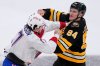 Boston Bruins left wing Tanner Jeannot (84) fights against Montreal Canadiens right wing Josh Anderson, left, during the first period of an NHL hockey game, Tuesday, Dec. 23, 2025, in Boston. (AP Photo/Charles Krupa)