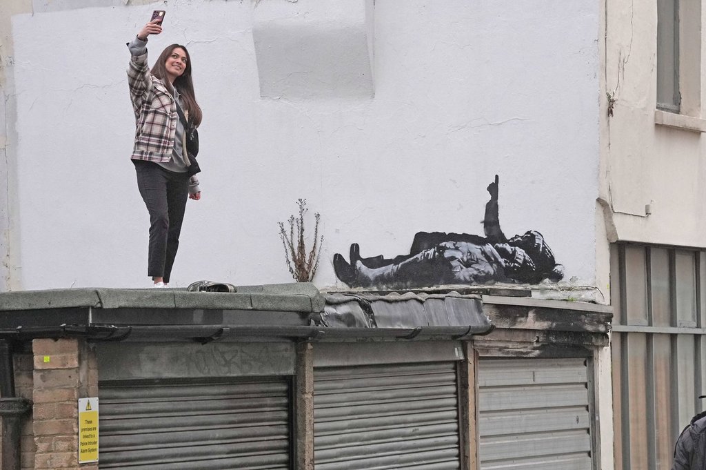 Banksy unveils new art in London following speculation over murals
