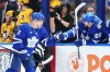Toronto Maple Leafs forward Max Domi (11) celebrates his goal against the Pittsburgh Penguins with forward William Nylander (88) during third period NHL hockey action in Toronto on Tuesday, Dec. 23, 2025. THE CANADIAN PRESS/Nathan Denette