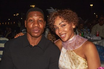 Two Hollywood stars, Jonathan Majors, left, and Meagan Good, attend a private ceremony where they were awarded their Guinean citizenship in Conakry, Guinea, Friday, Jan. 9, 2026. (AP Photo/ Fode Toure)