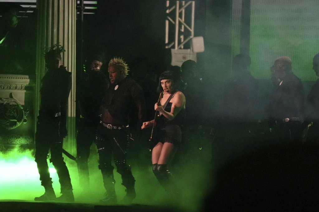 Joni Mitchell wins best historical album Grammy, wears “Ice Out” button on stage