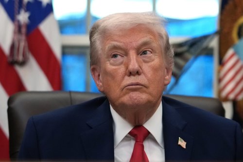 President Donald Trump listens during an event on addiction recovery in the Oval Office of the White House, Thursday, Jan. 29, 2026, in Washington. (AP Photo/Allison Robbert)