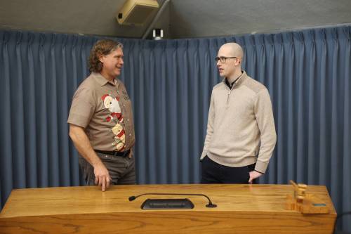 Brandon Mayor Jeff Fawcett and Brandon resident James Epp visit inside council chambers at Brandon City Hall in December. (Tim Smith/The Brandon Sun)