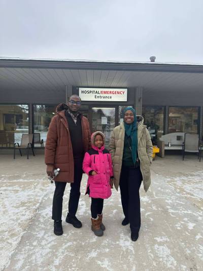 Family physicians Shamsudeen and Olamide Usman toured the Tri-Lake Health Centre in Killarney with one of their three children, Heebatullah (middle). The couple begins practising family medicine at the hospital in August. (Supplied)